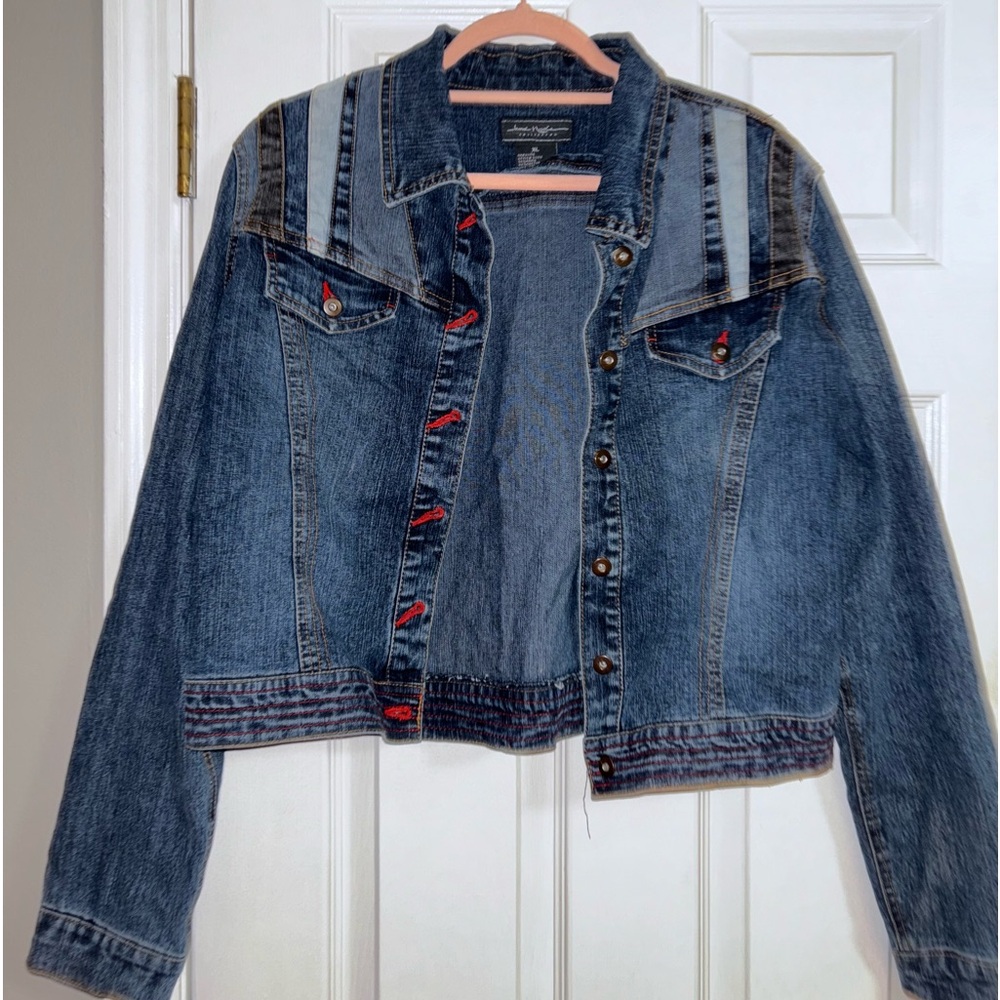 Vintage denim jacket with red accents